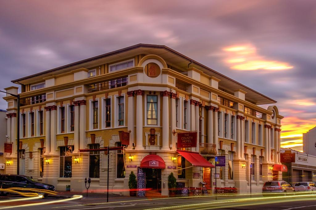 Art Deco-style hotel in Hawke's Bay at sunset. 