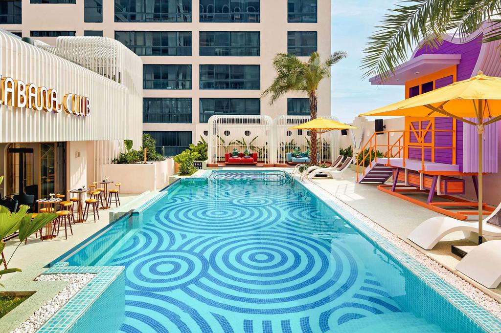 Miami-inspired pool club at Mövenpick Hotel in Hanoi.