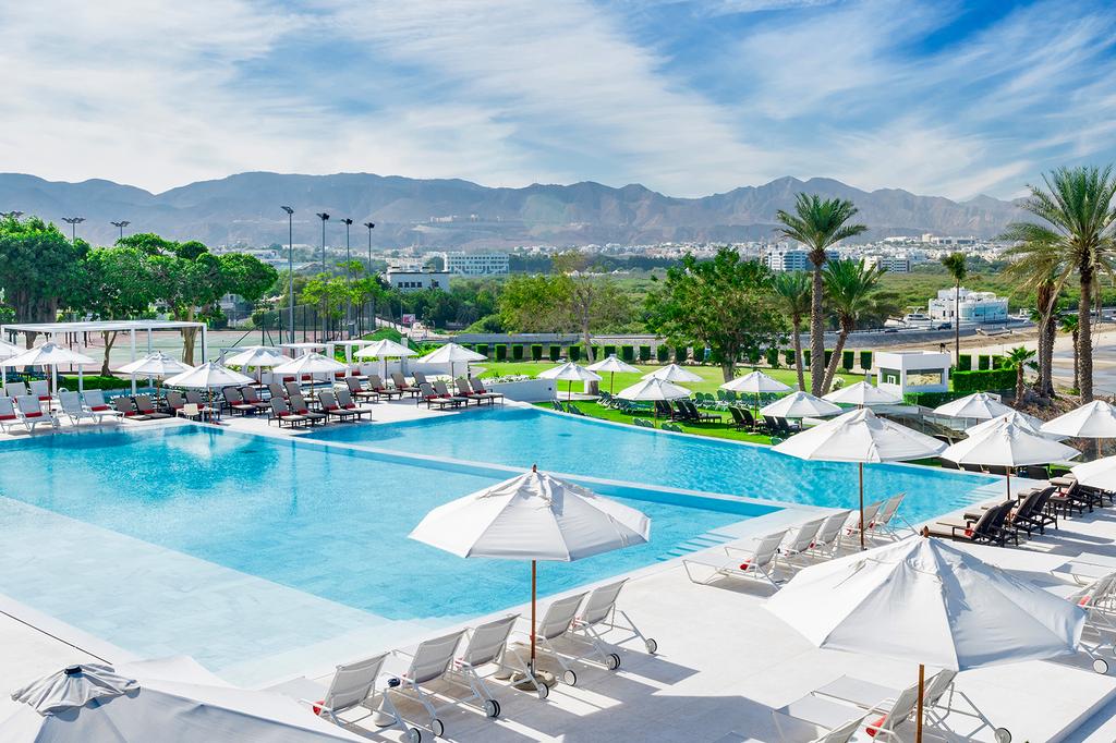 Ocean-facing infinity pool at Crowne Plaza Muscat in Oman.