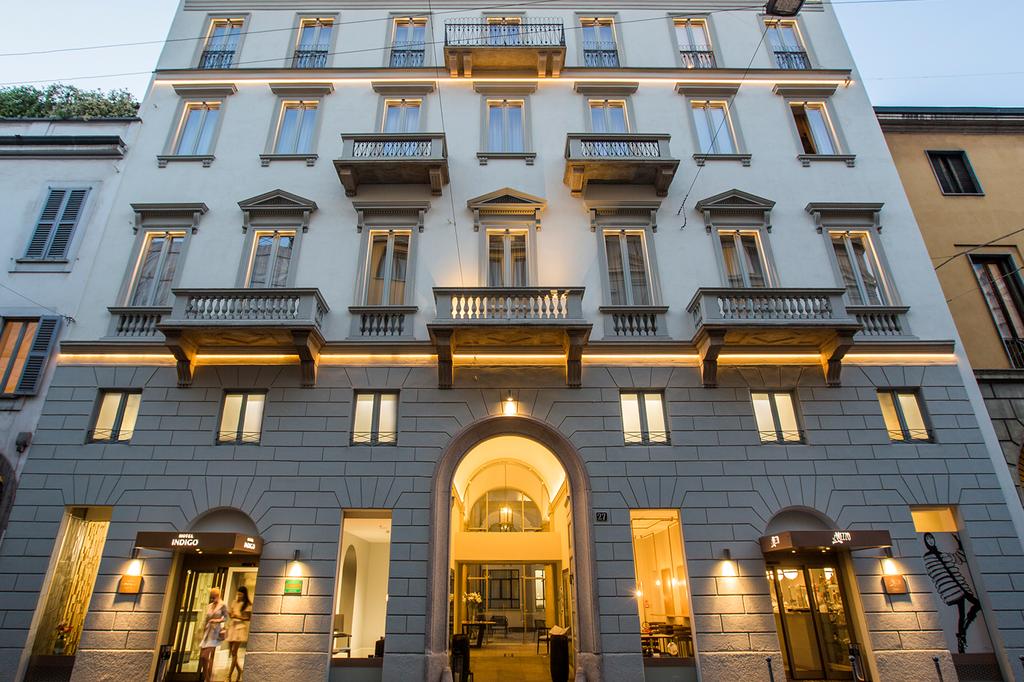 Boutique Hotel Indigo Milan set in a historic 19th-century building.