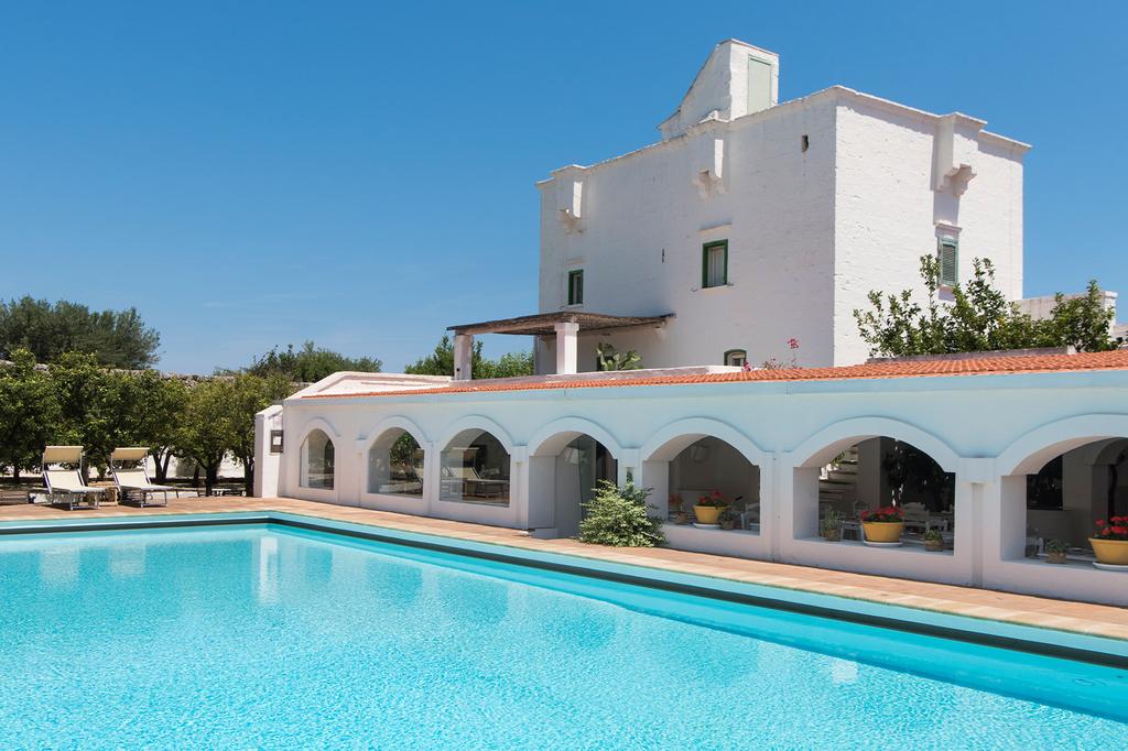 Outdoor pool at a luxurious 17th-century Puglian residence Il Melograno. 