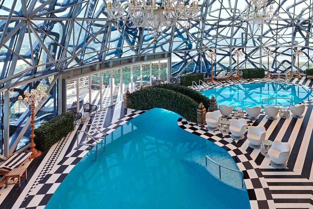 Indoor rooftop pool at Mondrian Doha
