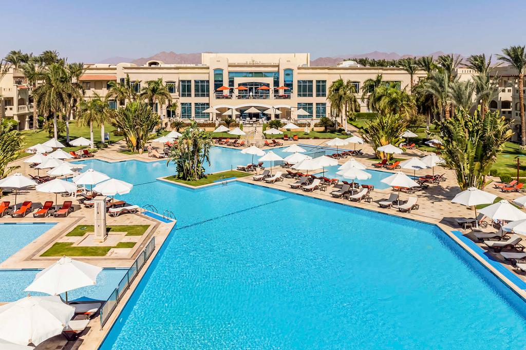 Luxurious adults-only resort in Sharm El Sheikh with multiple pools and lush gardens.