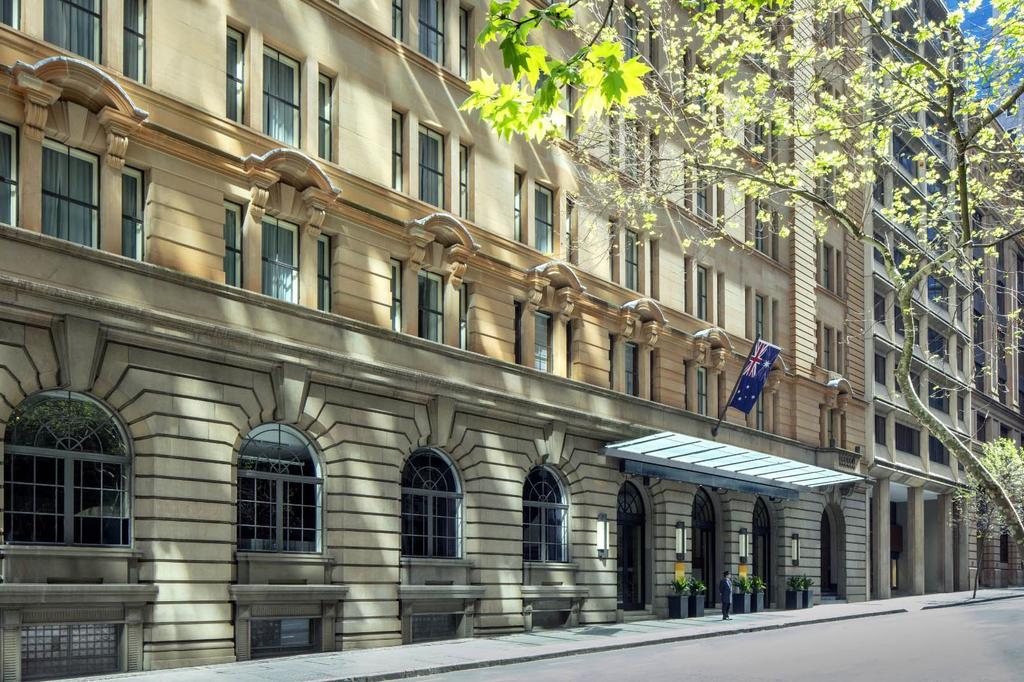 Elegant facade of a five-star hotel in Sydney's historic architecture.