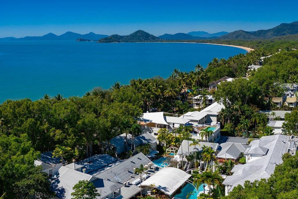 Aerial view of The Reef House Adults Retreat with lush tropical surroundings at Palm Cove.