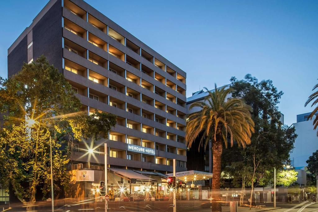 Mercure Hotel in Perth CBD near Swan River at dusk.
