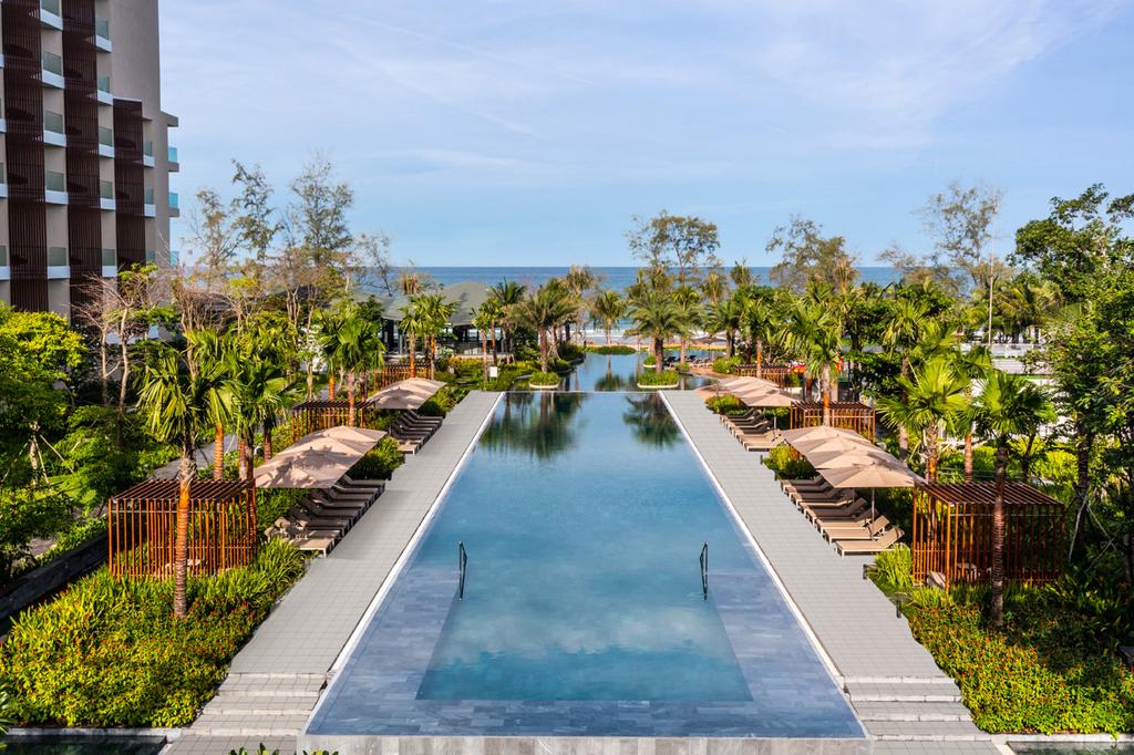 Infinity pool at beachfront resort with ocean view in Phu Quoc.