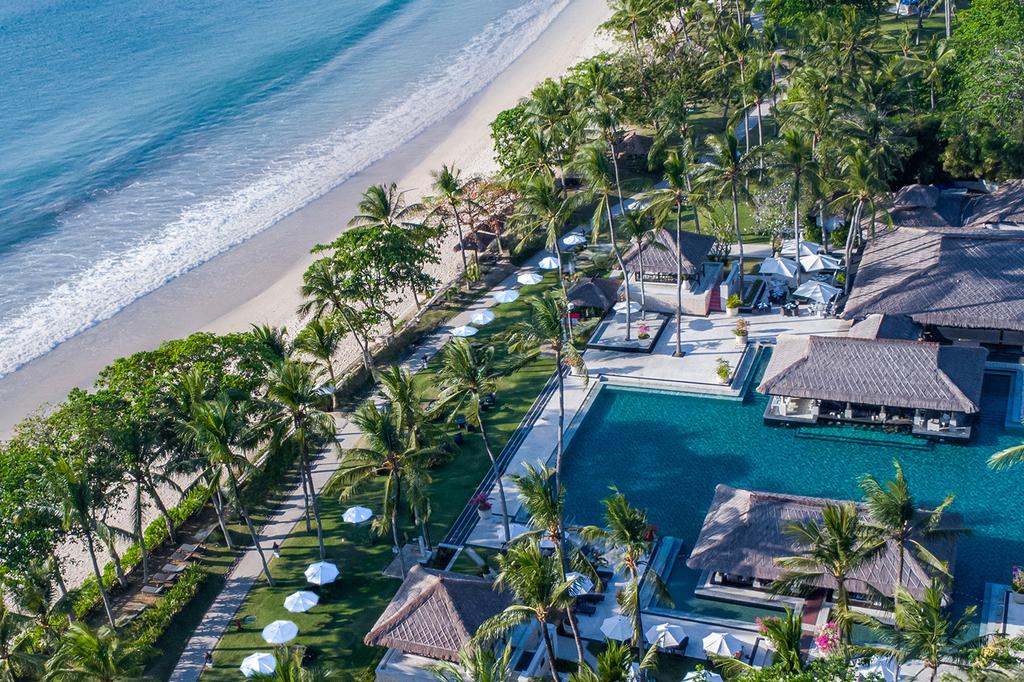 Aerial view of a luxury beachfront InterContinental Bali Resort in Jimbaran Bay, Bali. 