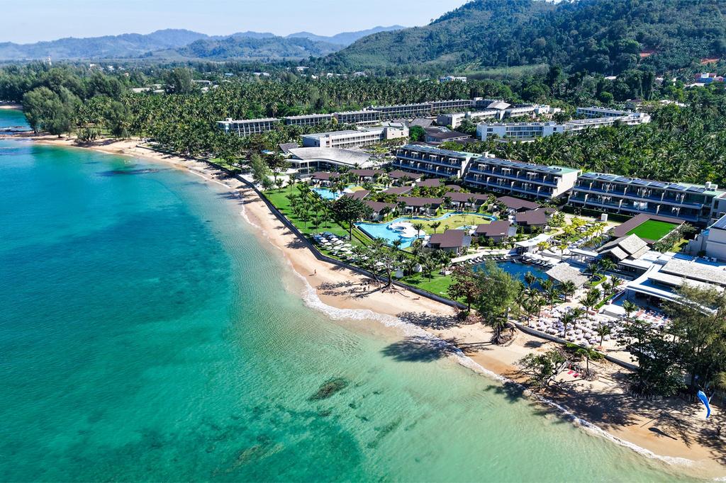 Aerial view of a beachfront resort on Nang Thong Beach. 