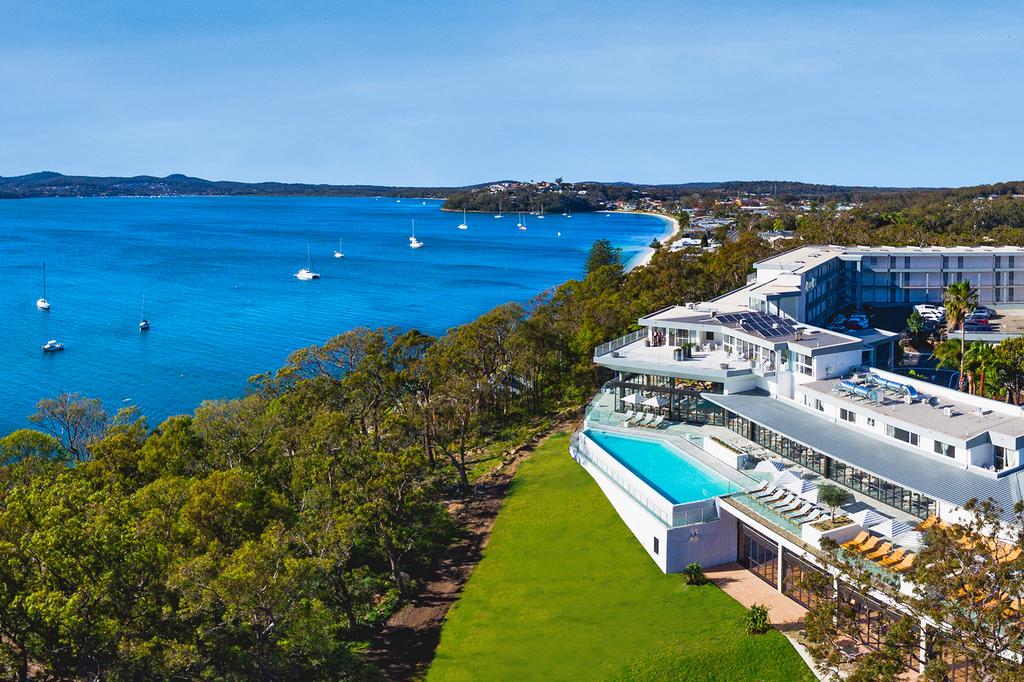 Boutique Bannisters Port Stephens hotel with infinity pool overlooking azure bay in Port Stephens.