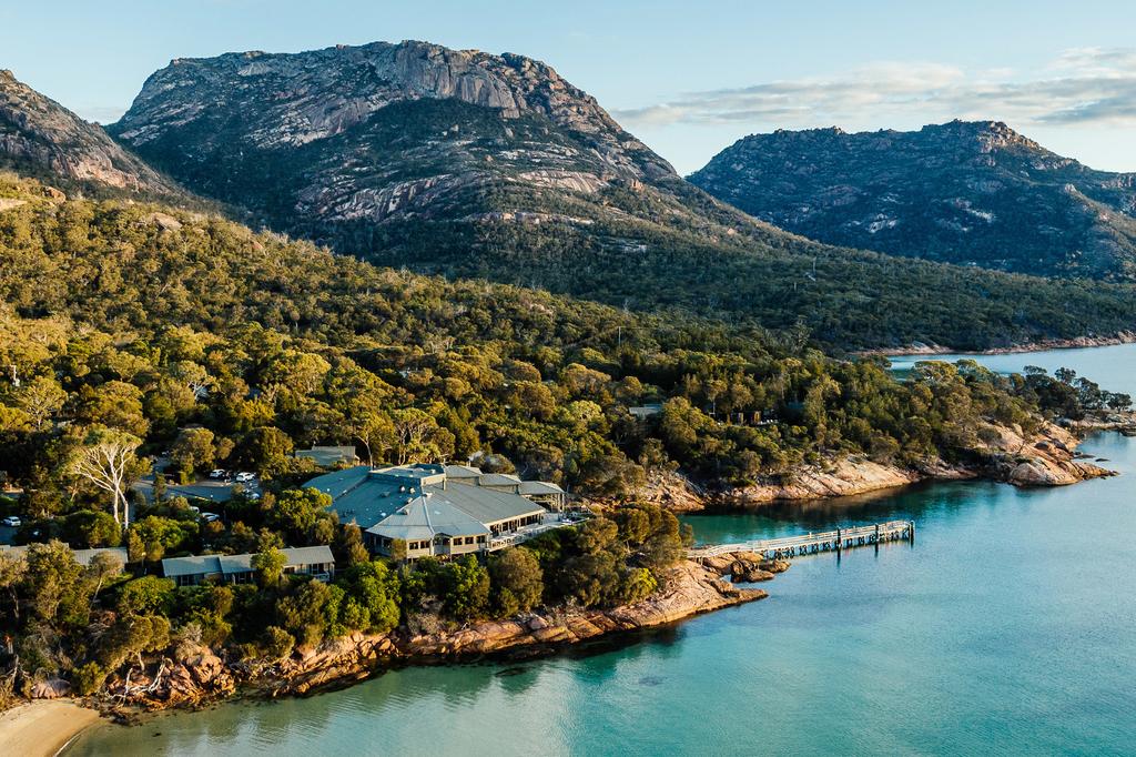 A luxury lodge surrounded by mountains and water in Freycinet National Park.