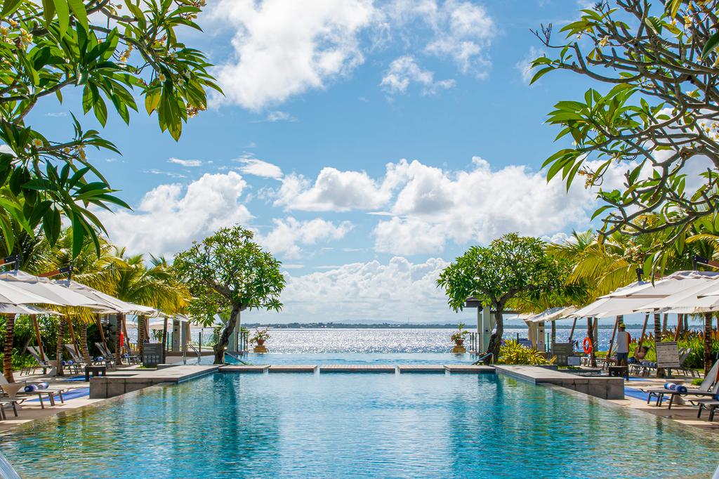 Infinity pool at Crimson Resort and Spa Mactan with ocean views.