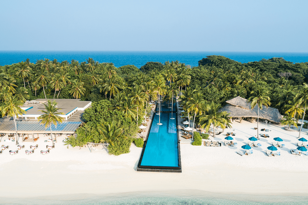 Aerial view of Sirru Fen Fushi Private Lagoon Resort, home to the longest infinity pool in the Maldives.