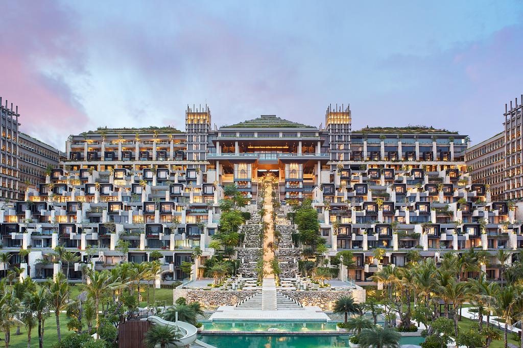 Luxurious Nusa Dua resort with grand architecture and tiered pool suites.