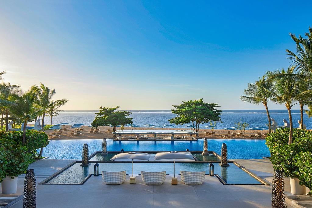 Luxurious Mulia Resort in Nusa Dua with expansive pools and tropical gardens.