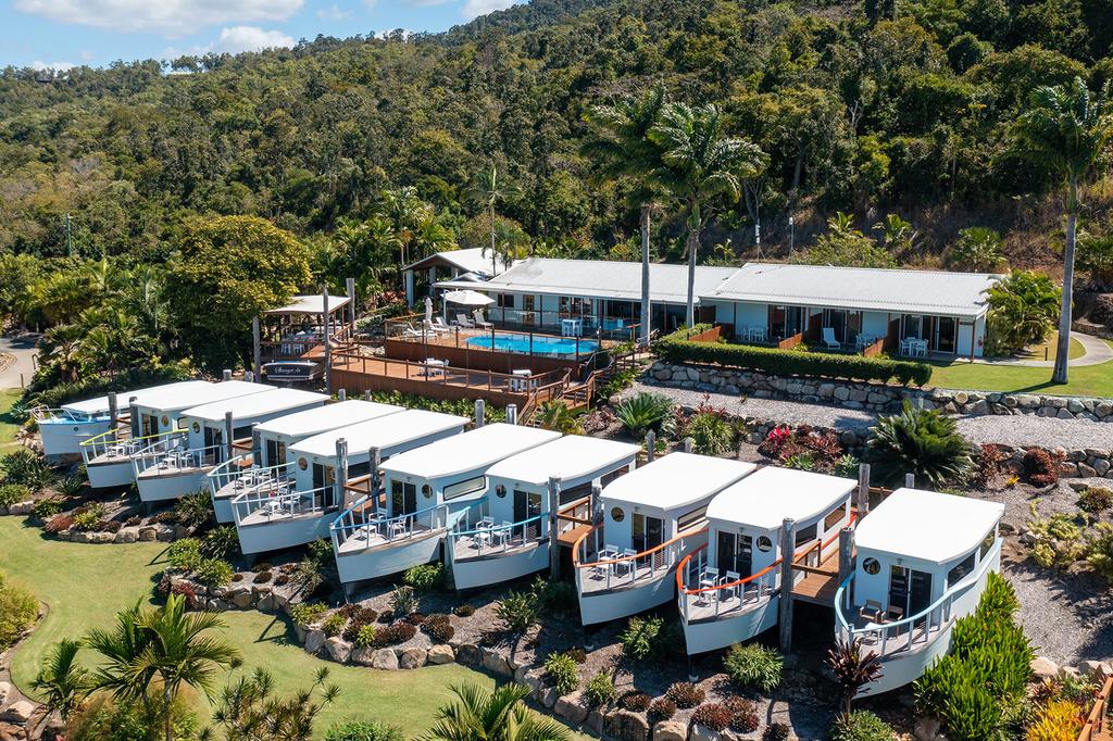 Nautical-inspired bungalows with Coral Sea views at Freedom Shores.