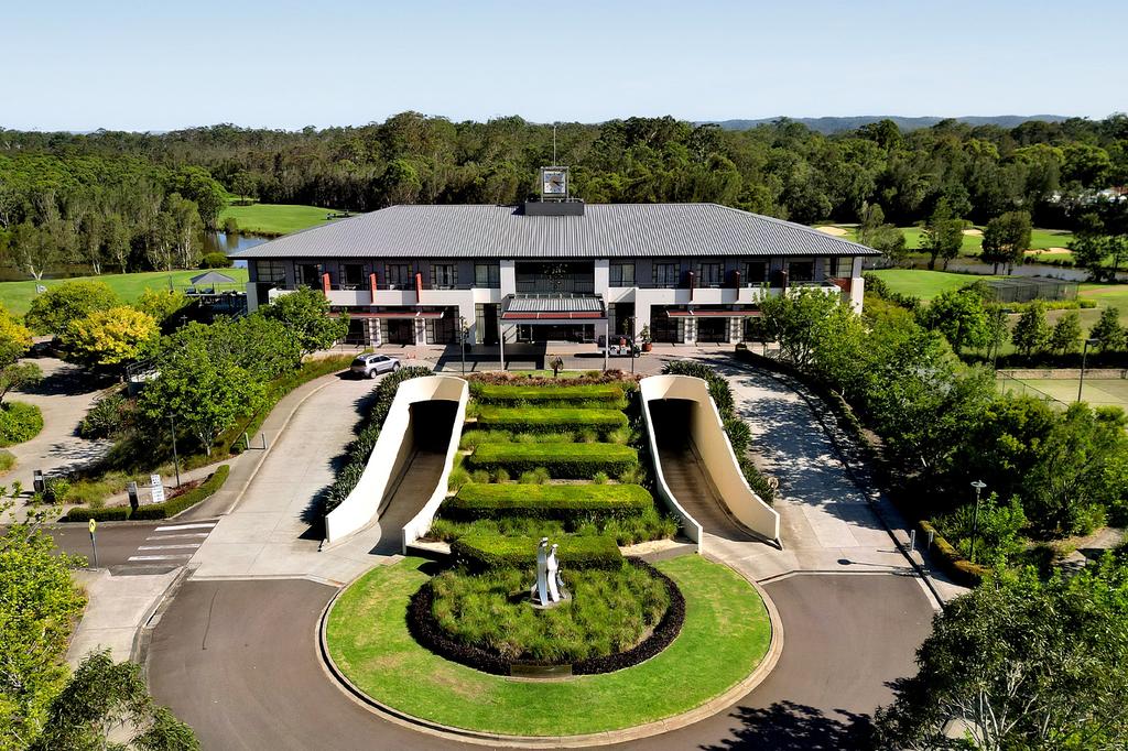 Aerial view of Mercure Kooindah Waters Central Coast with lush gardens and golf course.