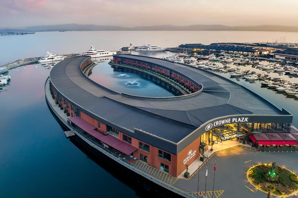 Overhead view of Crowne Plaza Istanbul Tuzla Viaport Marina on a private island.
