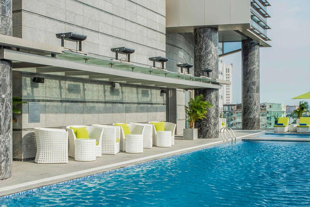 Rooftop pool area at Pullman Hotel in Ho Chi Minh City.