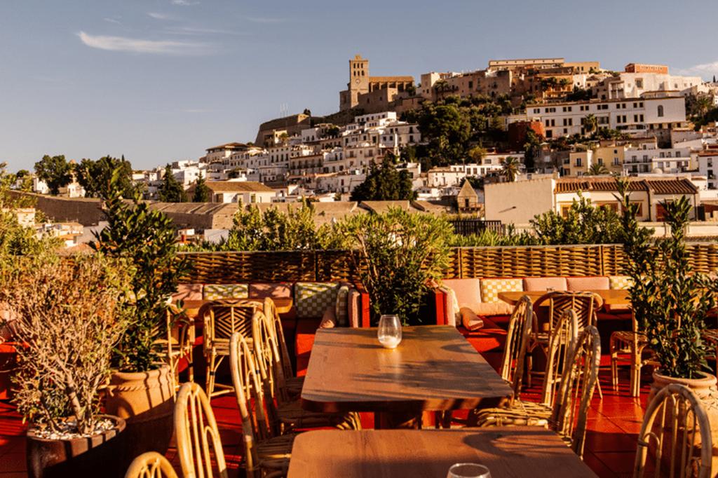Rooftop bar with views of Ibiza's historic Old Town.