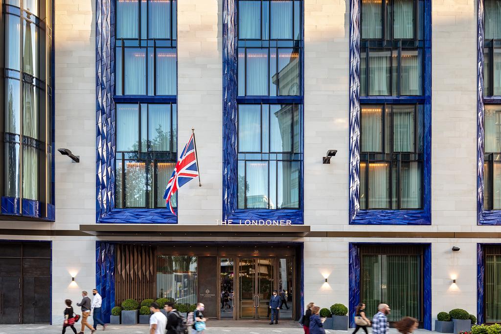 The elegant entrance of The Londoner Hotel at Leicester Square.