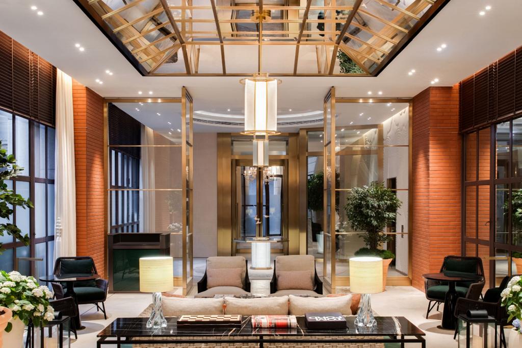 Luxurious lobby with elegant decor and plush seating at Lanson Place Causeway Bay.