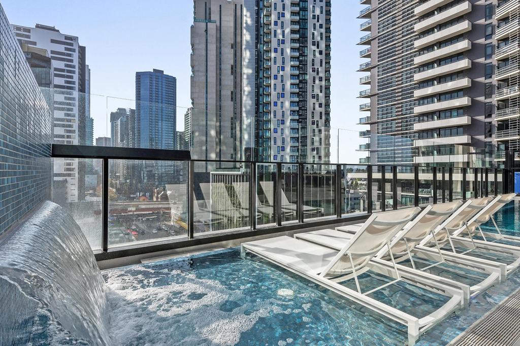 Chic rooftop pool with city views at Shadow Play by Peppers in Melbourne.