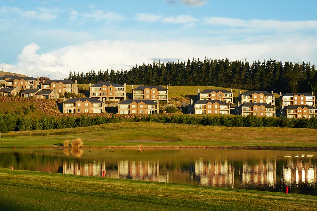 Terrace Downs Resort overlooking a golf course and lake in Canterbury.