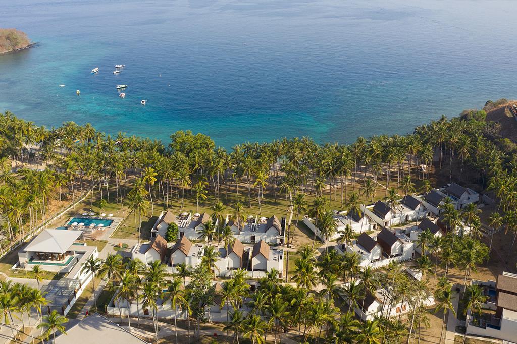 Aerial view of The Kayana Beach Lombok by the ocean.