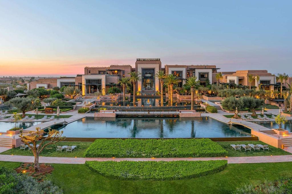 Luxurious resort with a vast pool and stunning architecture in Marrakech.