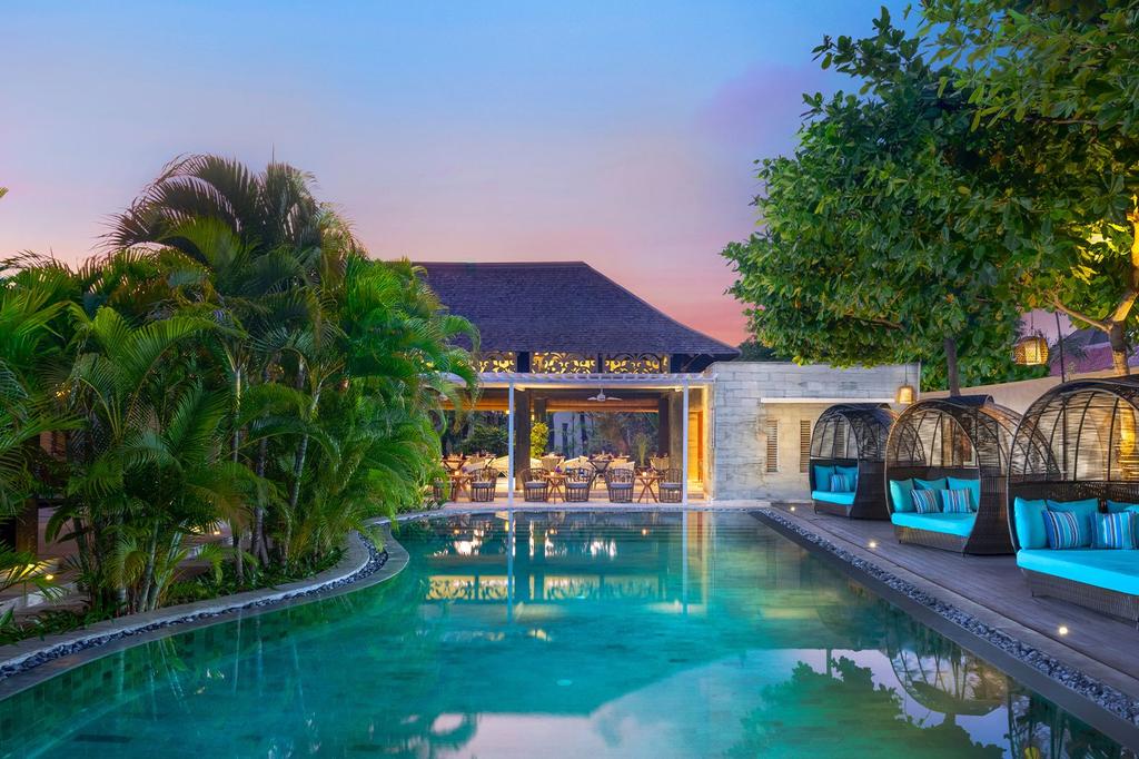 Tranquil poolside view at a Boutique Seminyak hideaway in Bali.