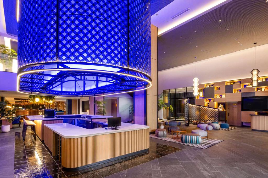 Contemporary hotel interior with vibrant lighting in Nara, Japan.