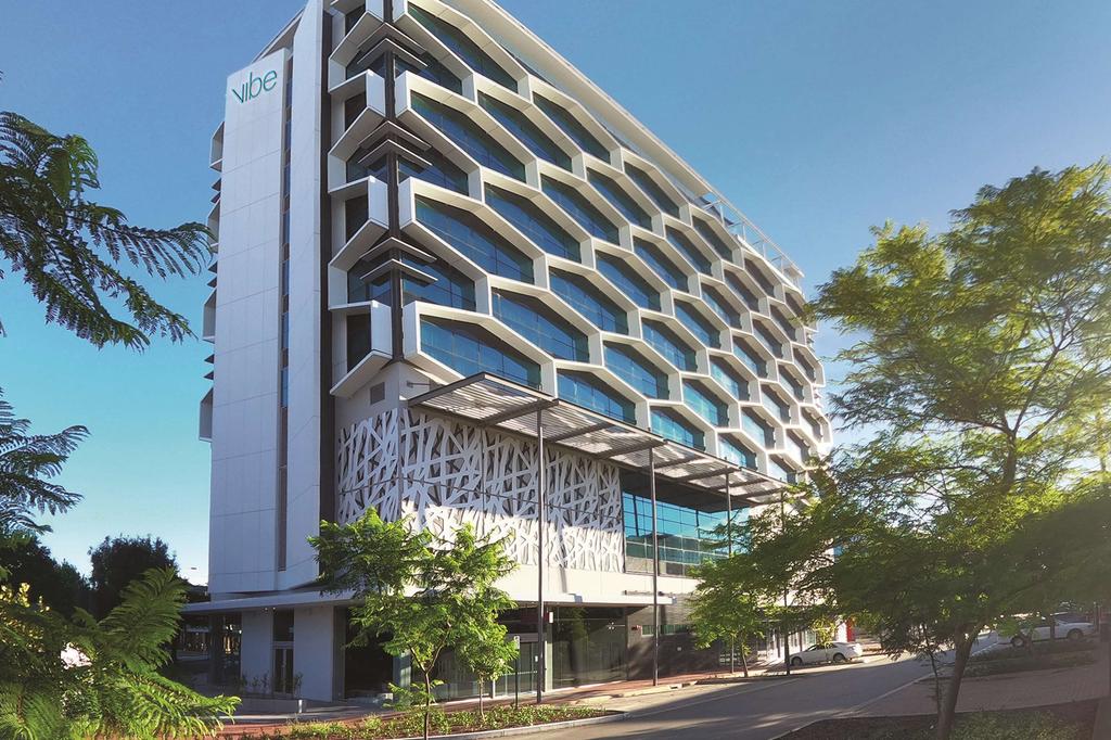 Vibe Hotel Subiaco Perth with modern architecture and leafy surroundings.