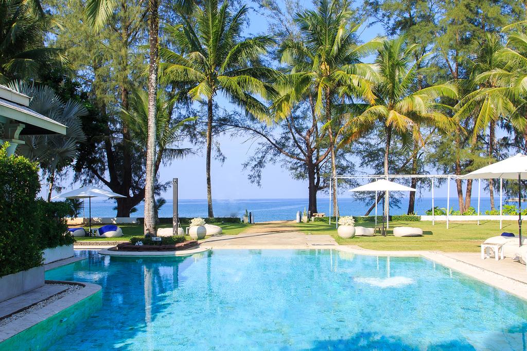Beachfront villas with a pool and ocean view at The Anda Mani Khaolak Beachfront Villas.