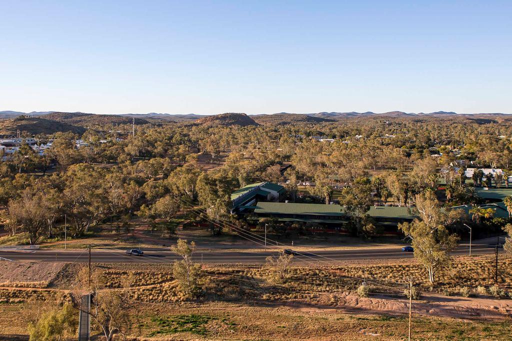 Aerial view of Alice Springs Red Centre Resort surrounded by trees.