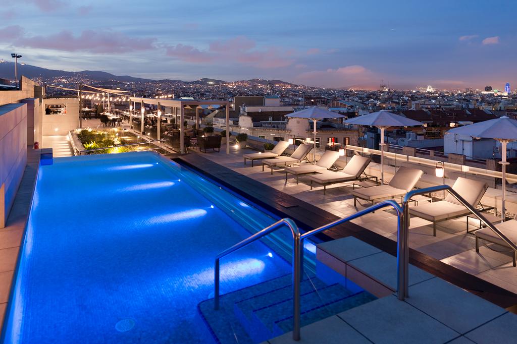 Rooftop terrace with pool and city views at InterContinental Barcelona.