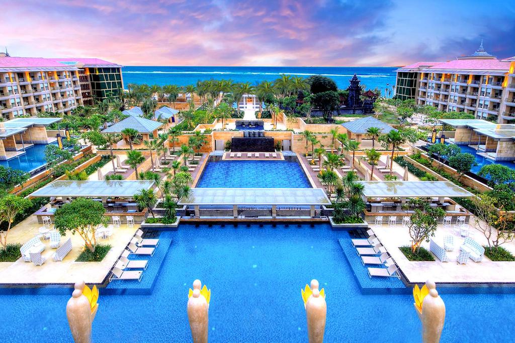Luxurious Mulia Resort in Nusa Dua with expansive pools and tropical gardens.