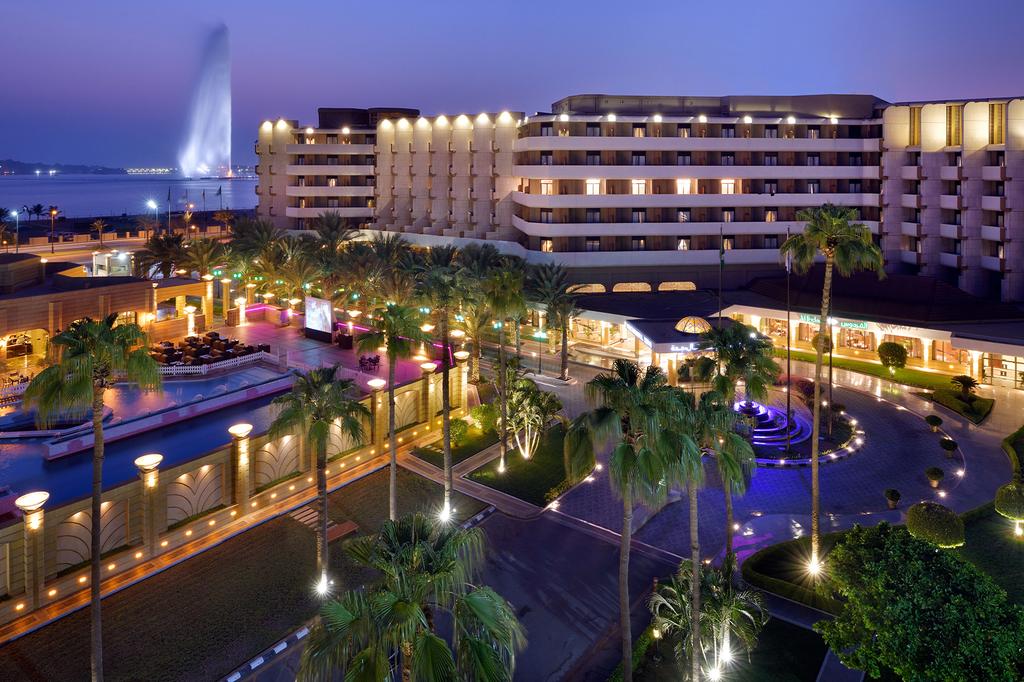 InterContinental Jeddah with pool and Red Sea view at dusk.