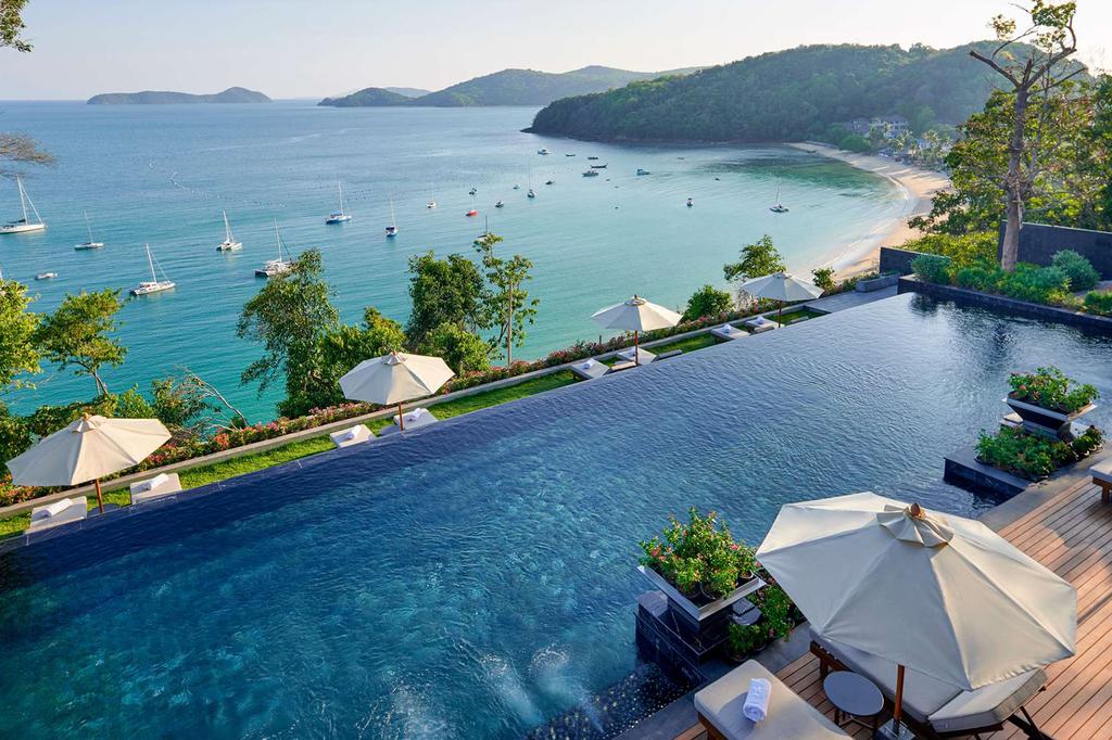 Infinity pool overlooking Ao Yon Bay and Andaman Sea in Phuket.