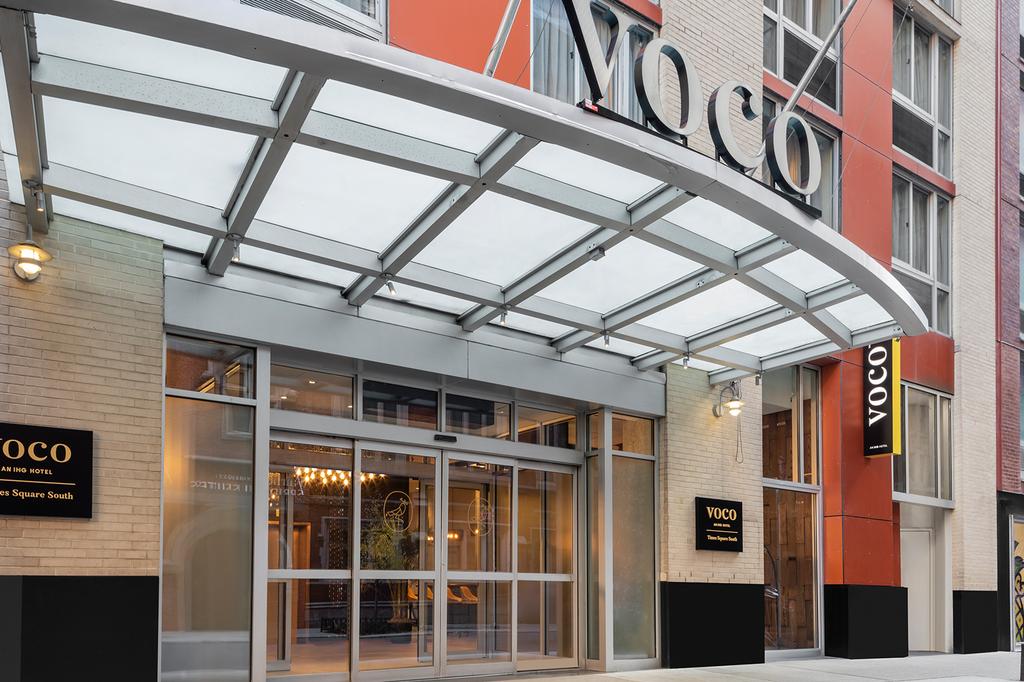 Entrance of voco Times Square South Hotel in New York City.