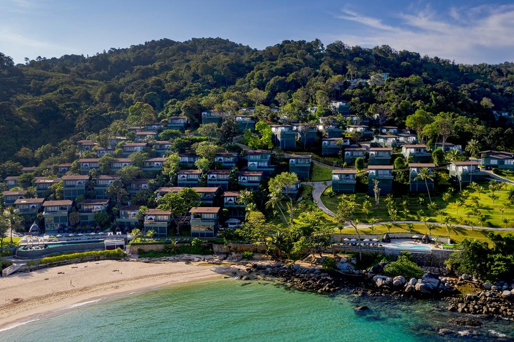 Luxurious villas on Phuket cliffside overlooking Kata Noi Beach. 