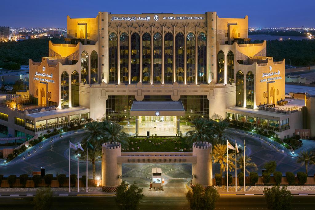 InterContinental Al Ahsa hotel lit at night in Saudi Arabia's largest oasis.