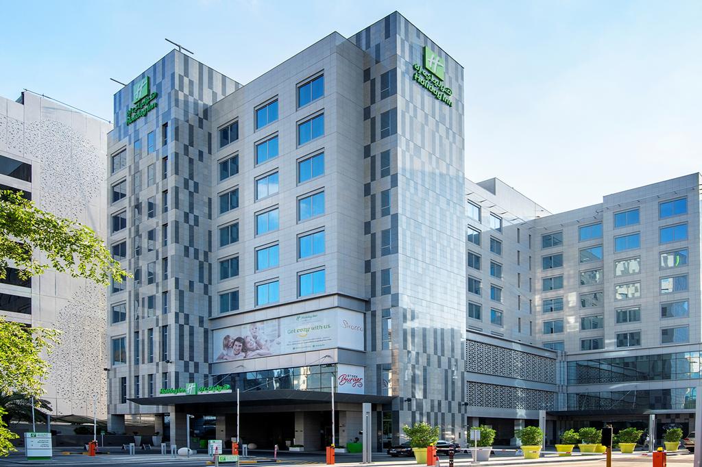 Modern hotel in Doha's bustling financial district.