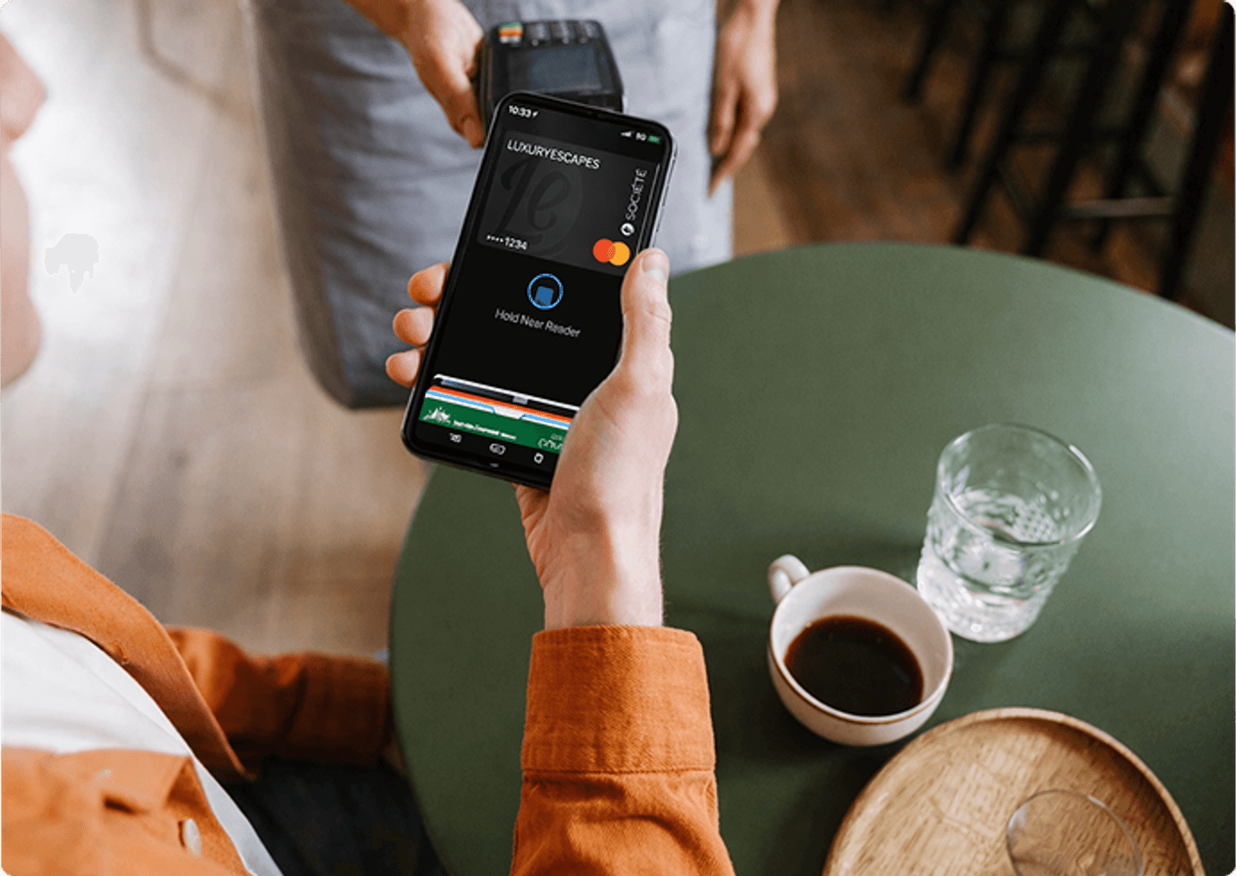 Person using phone with Luxury Escapes app