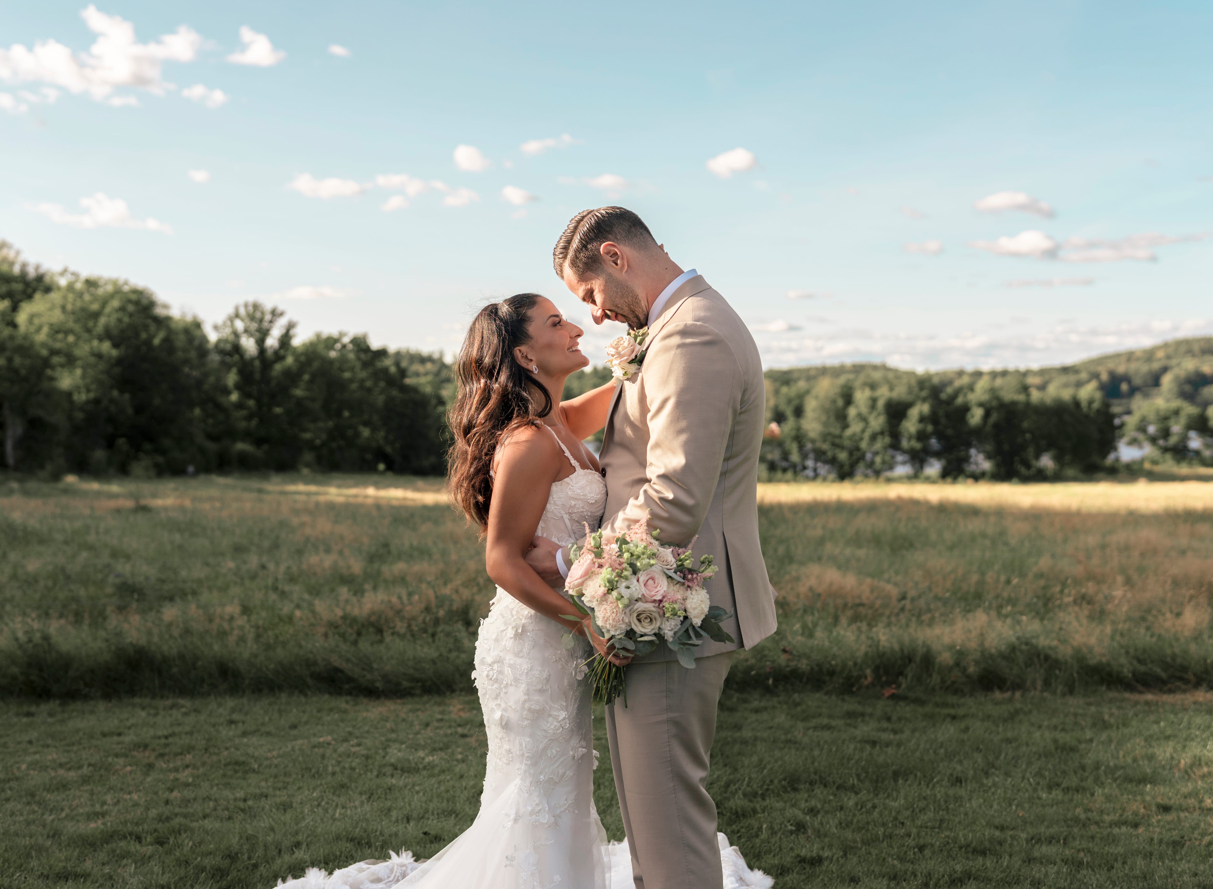 A couple holding hands on a landscape