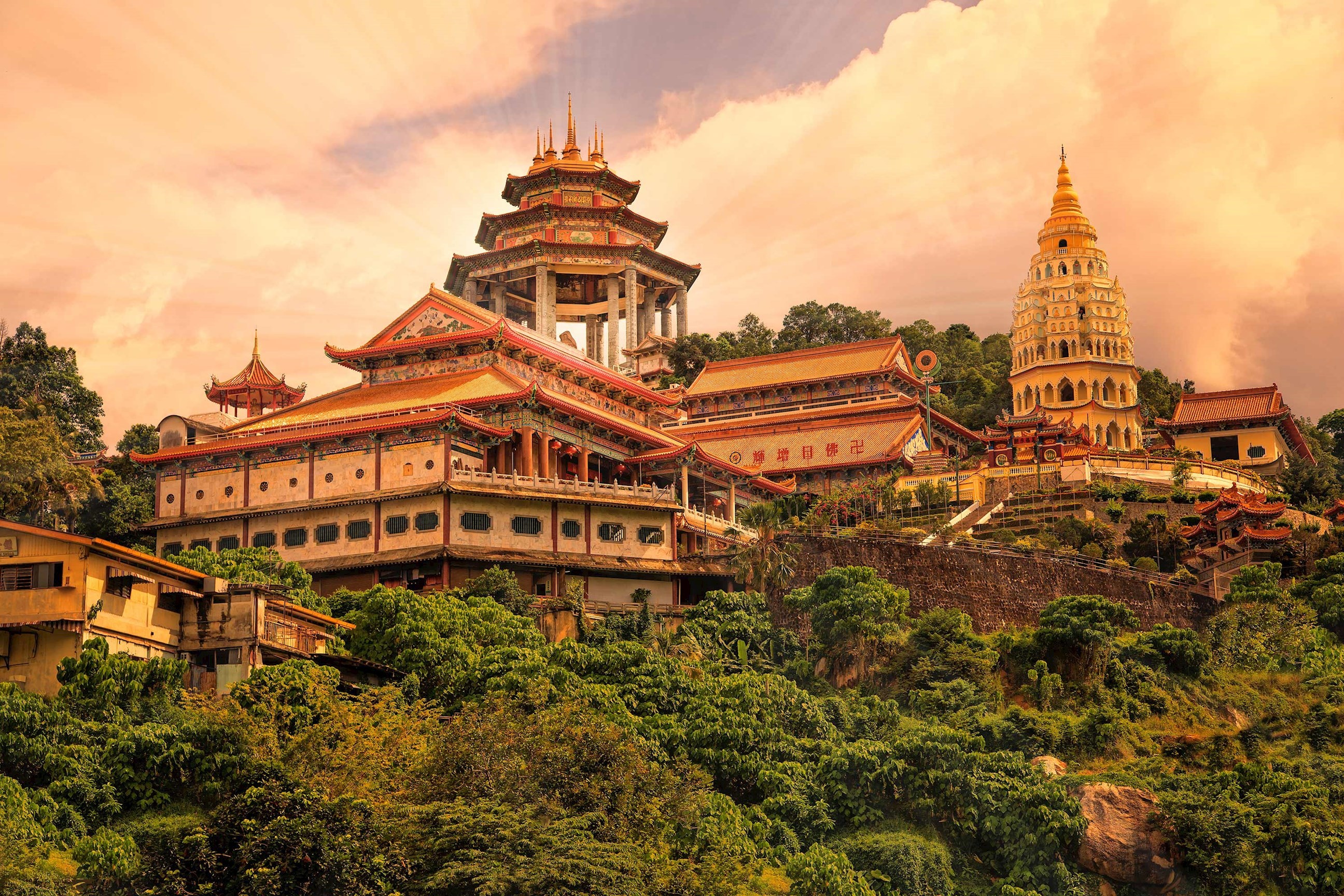 Vibrant ancient temple under the afternoon sun in Penang, Malaysia