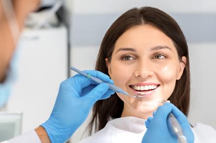 Dental Exam, Two X-Rays and Polish + $50 Voucher - Four Locations