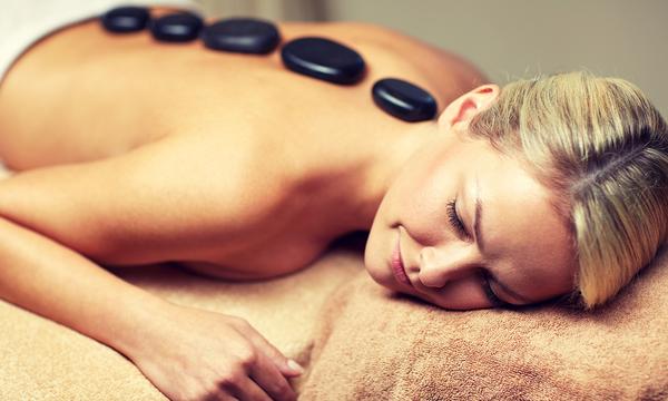 Hour-Long Hot Stone Massage or Facial at Three Locations