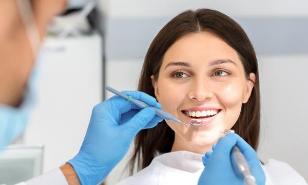 Dental Exam, Two X-Rays and Polish + $50 Voucher - Four Locations