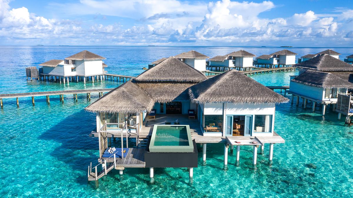 Five-Star Raffles Maldives Private Island Oasis with Daily Breakfast, Nightly Dinner & Roundtrip Male Transfers